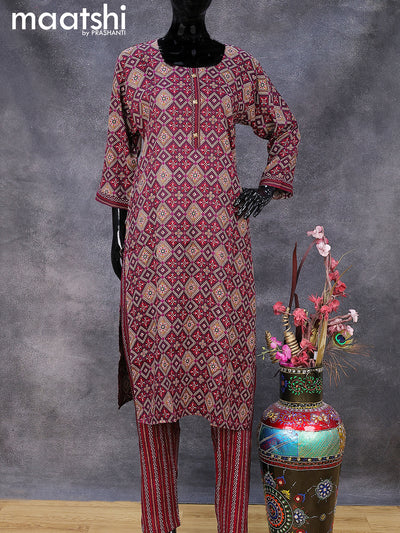 Rayon readymade kurti set wine shade with allover ikat prints & simple neck pattern and straight cut pant