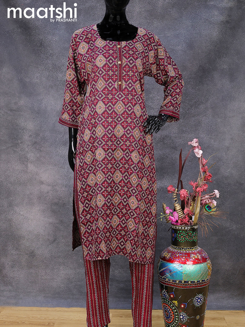 Rayon readymade kurti set wine shade with allover ikat prints & simple neck pattern and straight cut pant