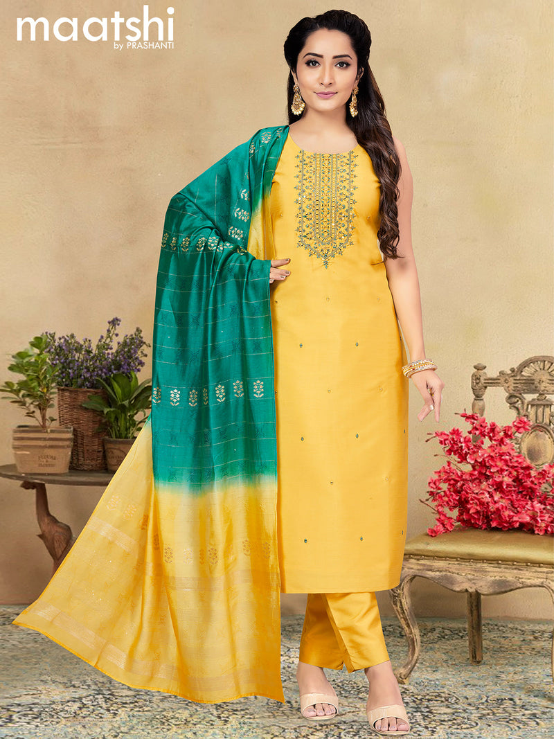 Raw silk readymade salwar suits pale yellow with embroidery & mirror work neck pattern and straight cut pant & zari stripe dupatta sleeve attached