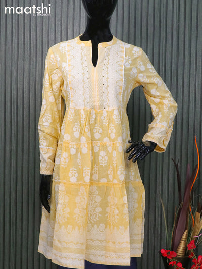 Cotton readymade short umbrella kurti pale yellow with allover prints & crocia lace work neck pattern and without pant