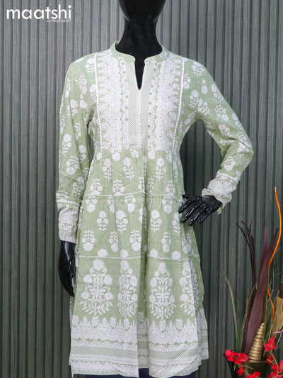 Cotton readymade short umbrella kurti pastel green with allover prints & crocia lace work neck pattern and without pant