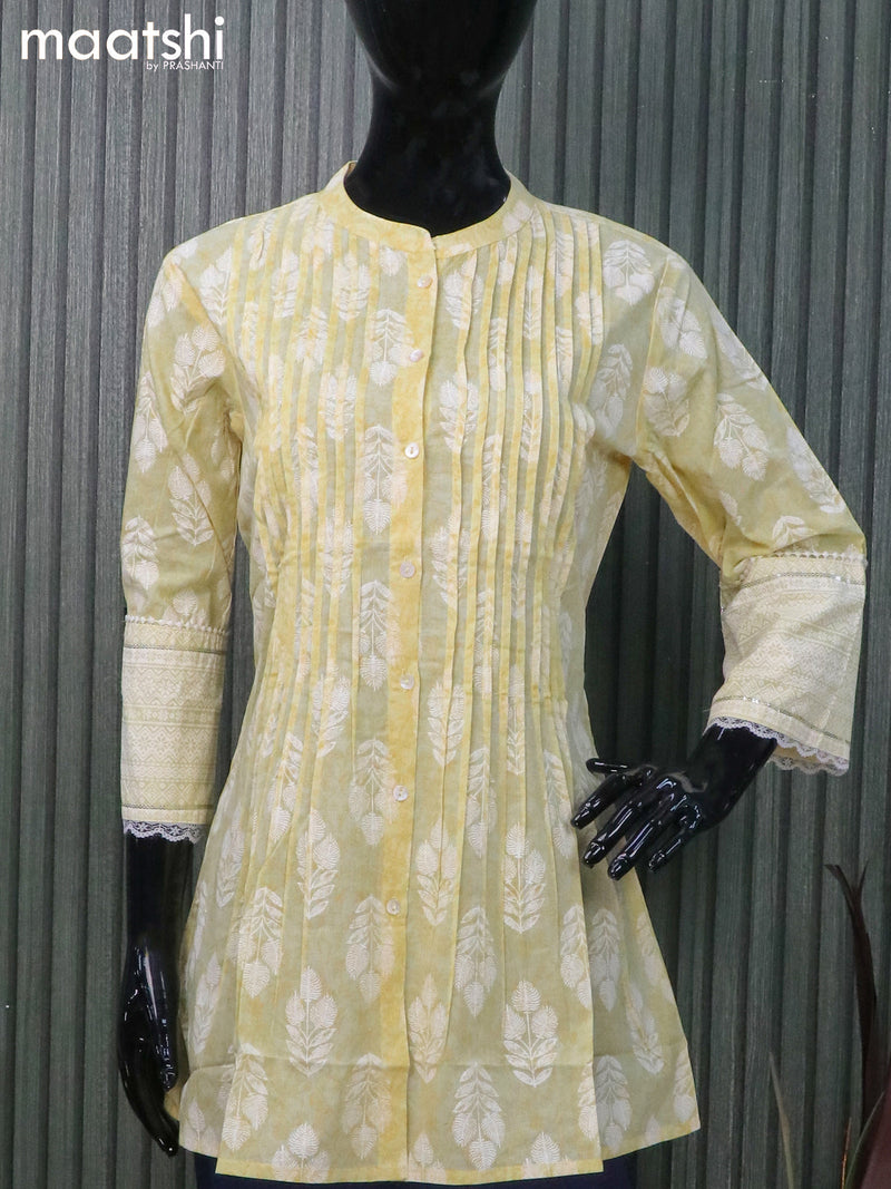 Cotton readymade short kurti pale yellow with allover prints & simple neck pattern and without pant