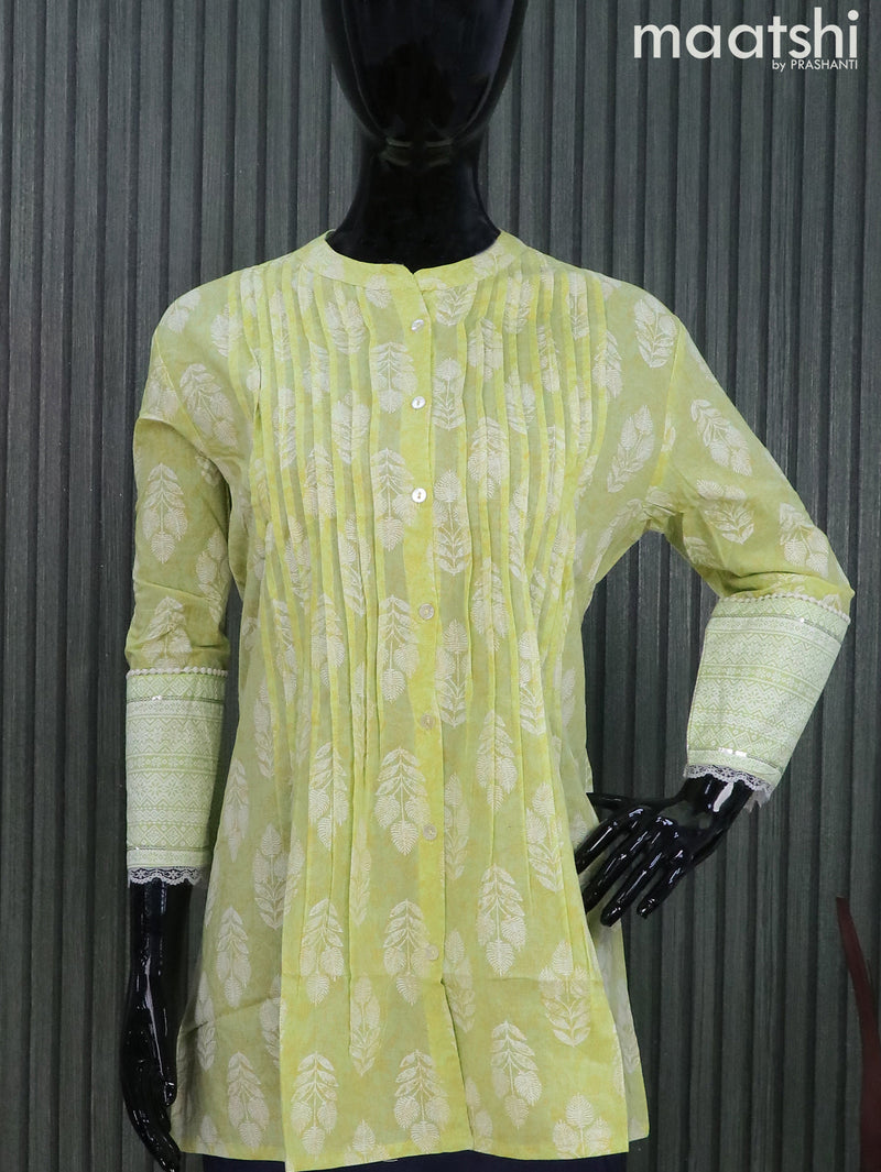 Cotton readymade short kurti light green with allover prints & simple neck pattern and without pant