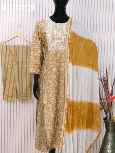 Modal readymade salwar suits dark mustard with floral prints & sequin work neck pattern and straight cut pant & sequin work chiffon dupatta
