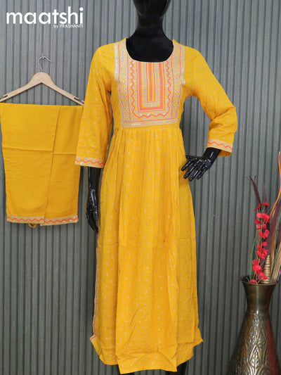 Cotton readymade naira cut salwar suits mustard yellow with allover prints & sequin work neck pattern and straight cut pant & chiffon dupatta