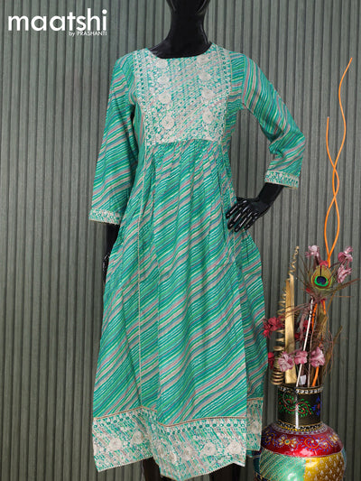 Modal readymade naira cut kurti teal blue  with allover prints & sequin gotapatti lace work neck pattern and without pant
