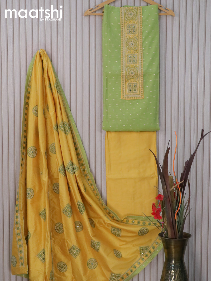 Raw silk dress material light green and yellow shade with zari woven buttas & embroidery patch work neck pattern and pant & embroidery dupatta