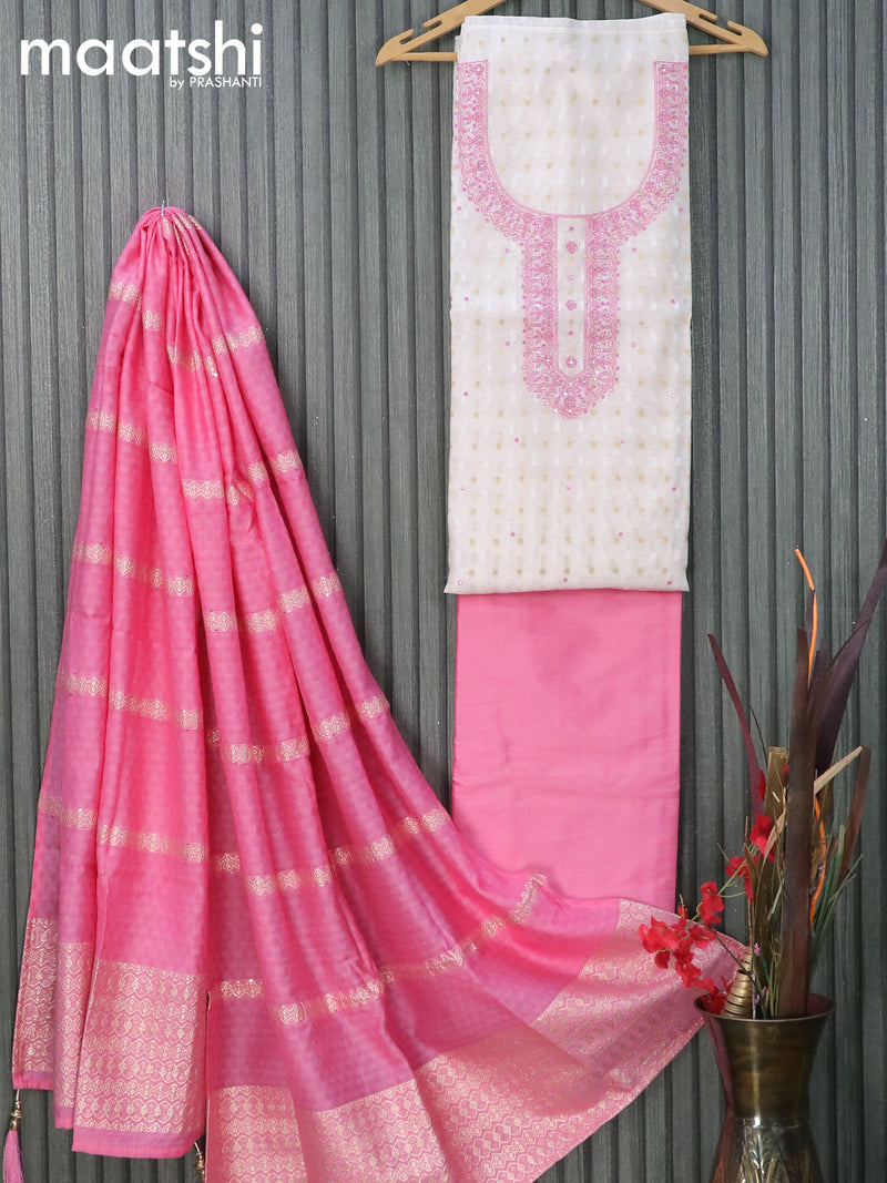 Raw silk dress material off white and light pink with zari woven buttas & mirror embroidery work neck pattern and pant & embroidery dupatta