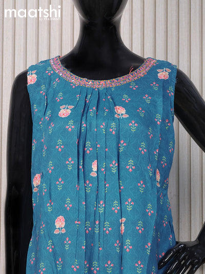 Muslin readymade kurti blue shade  with allover floral prints & embroidery neck pattern and without pant & sleeve attached
