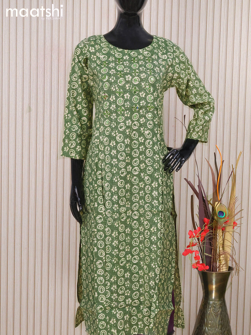 Muslin readymade kurti green and with allover batik prints