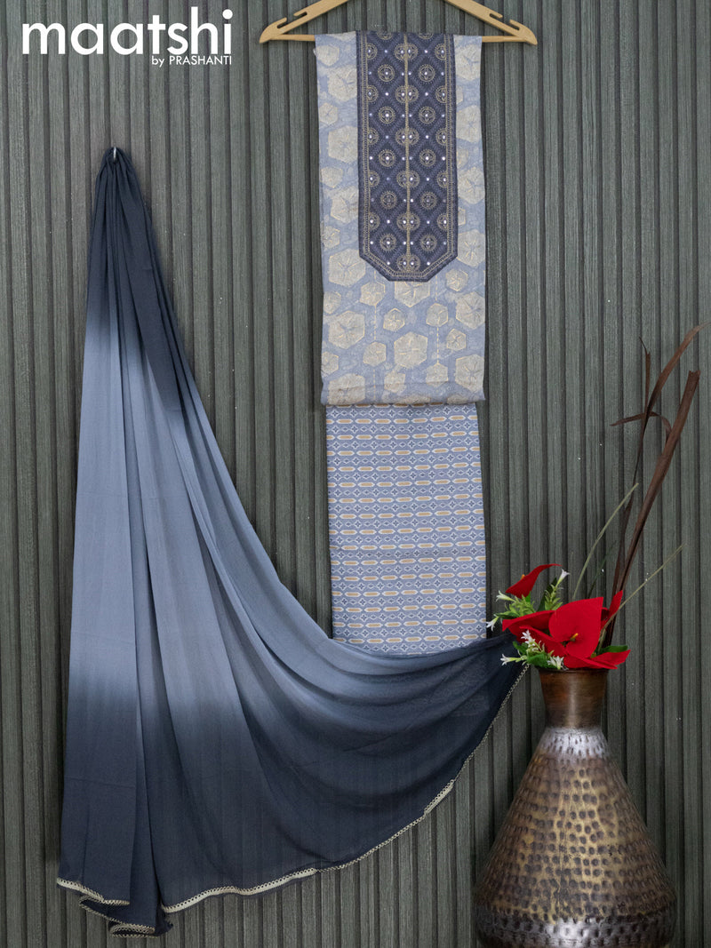 Cotton dress material grey  with allover prints & embroidery work neck pattern and bottom & nettted embroidery dupatta