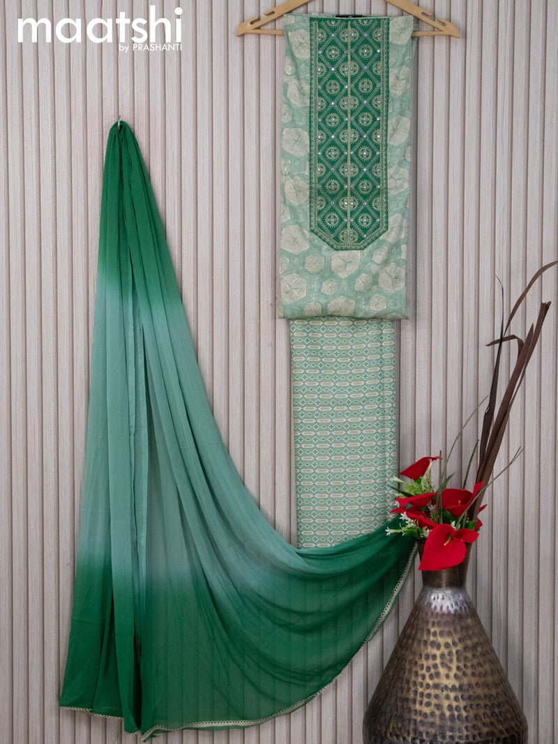 Cotton dress material teal green shade  with allover prints & embroidery work neck pattern and bottom & chiffon dupatta