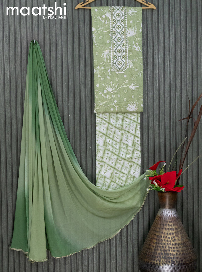 Cotton dress material pista green shade  with allover prints & embroidery work neck pattern and bottom & chiffon dupatta