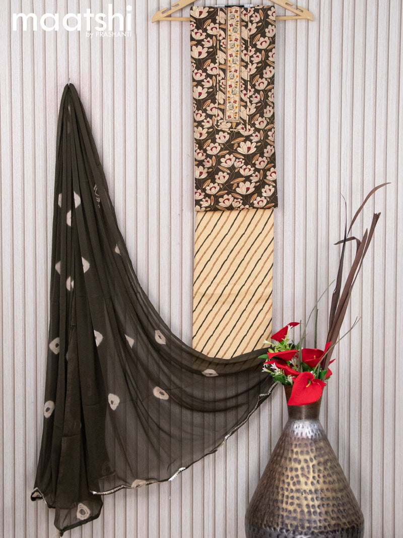 Cotton dress material dark sap green and cream with floral prints & embroidery patch work neck pattern and bottom & chiffon dupatta