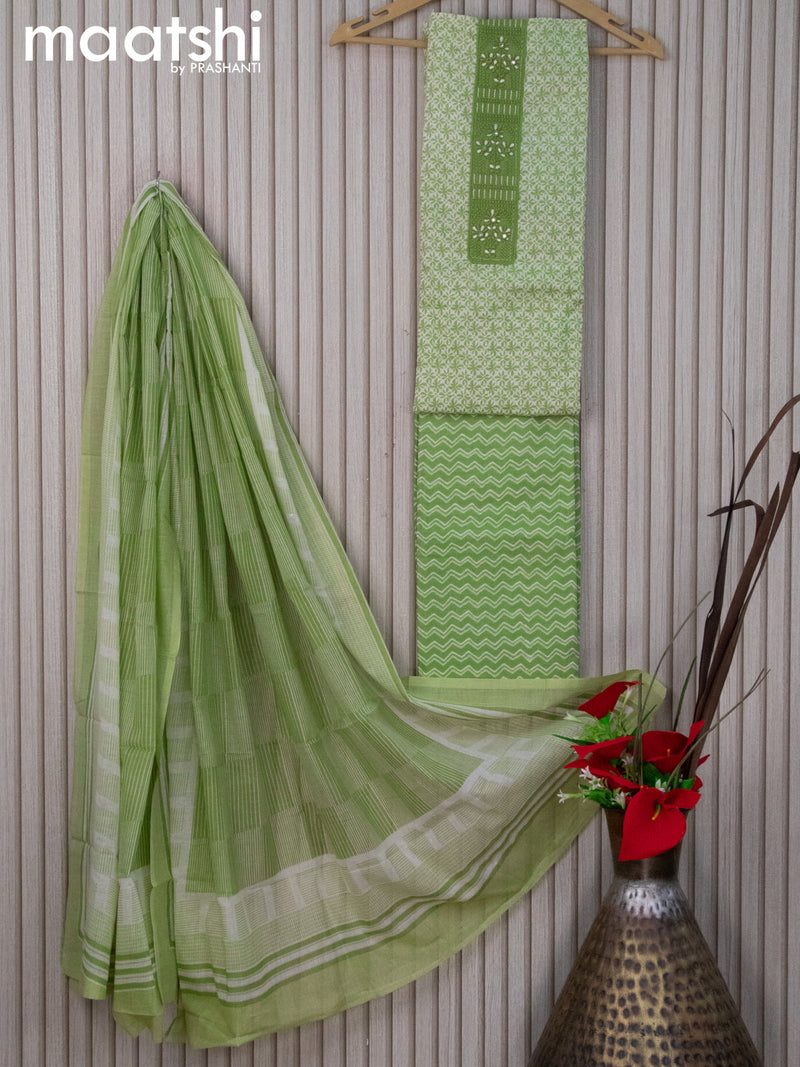 Cotton dress material light green and off white with allover prints & embroidery work neck pattern and bottom & dupatta