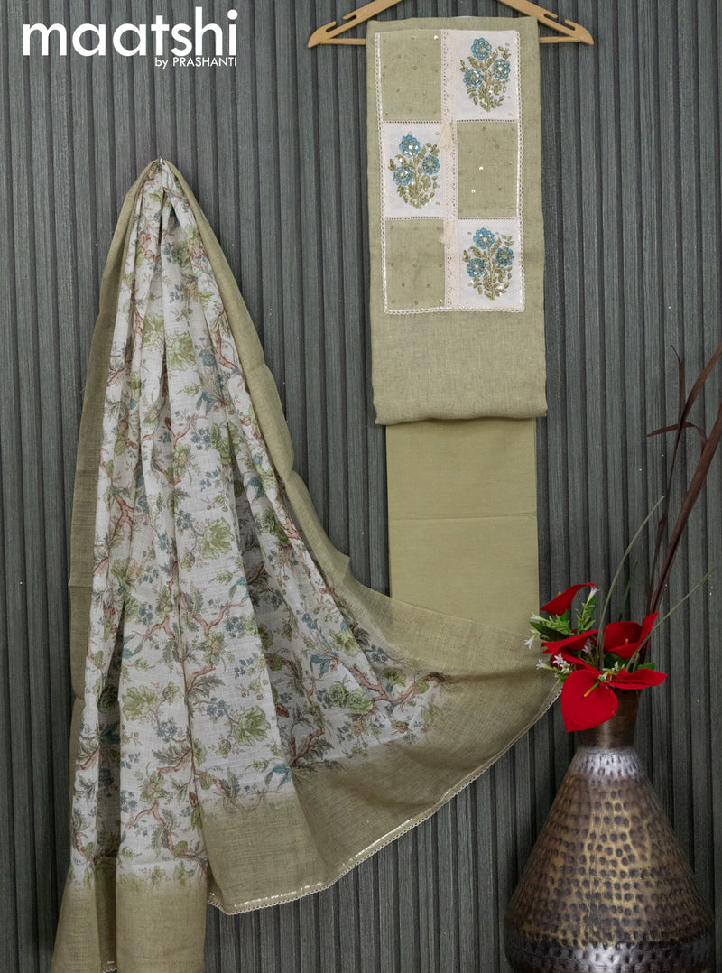 Cotton dress material elaichi green and cream with allover prints & floral embroidery work neck pattern and bottom & cotton dupatta