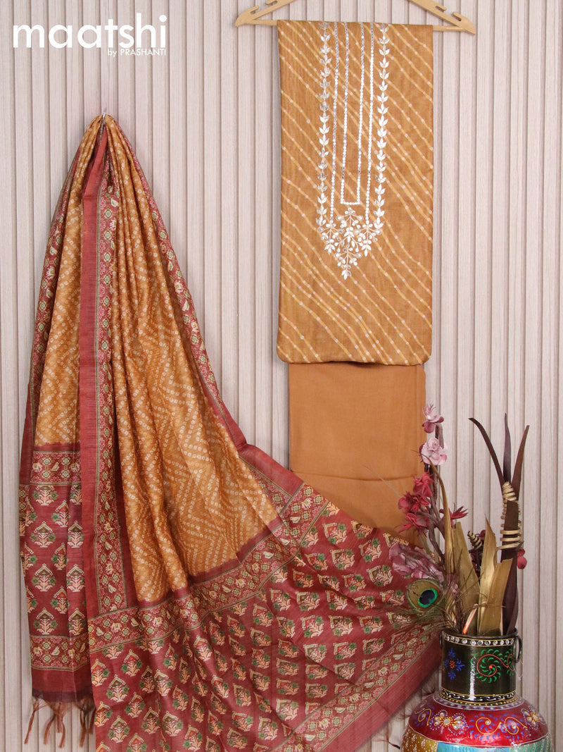 Chanderi dress material dark mustard  with allover prints & embroidery work and bottom & printed dupatta