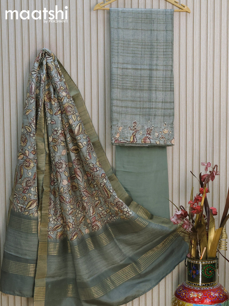 Semi tussar dress material pastel grey  with kalamkari prints & embroidery work and bottom & kalamkari printed dupatta
