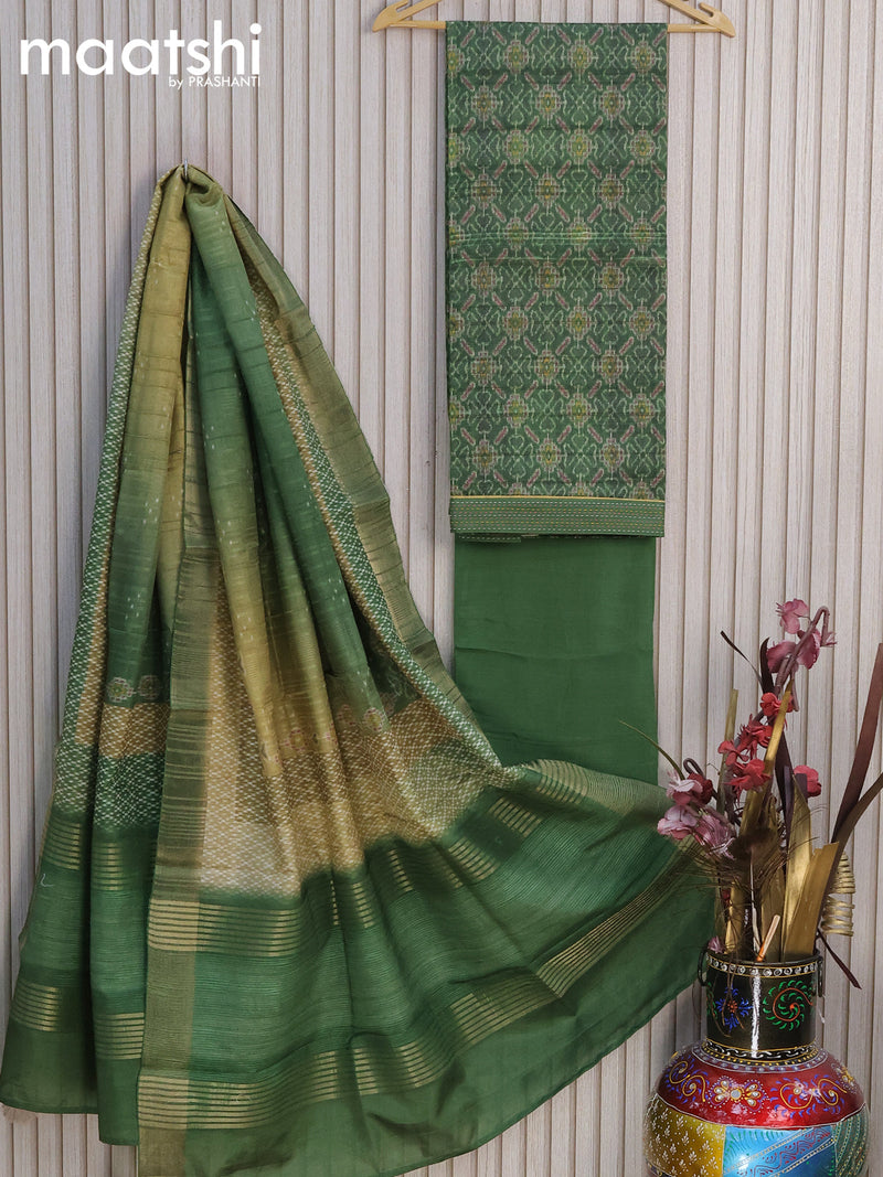 Semi tussar dress material green shade  with allover ikat prints and bottom & printed dupatta