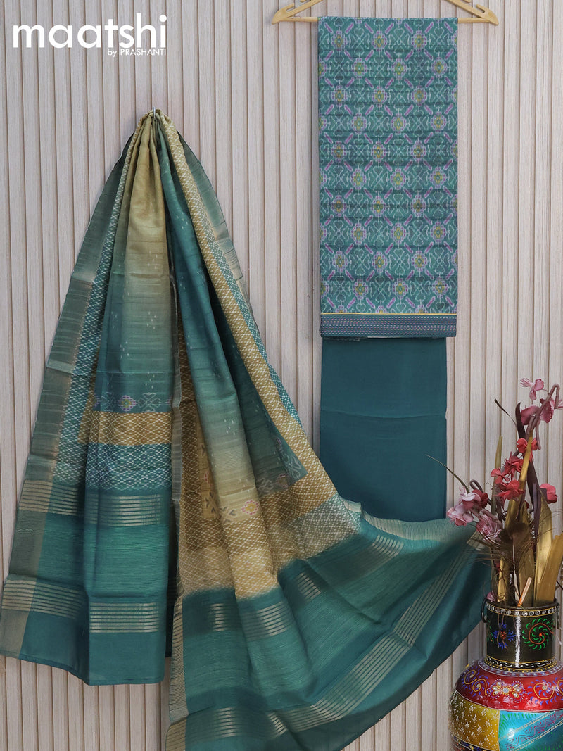 Semi tussar dress material greyish blue mehendi green shade with allover ikat prints and bottom & printed dupatta