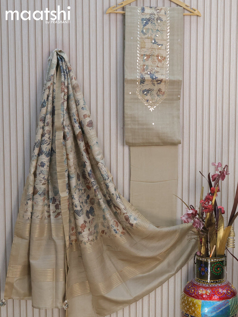 Semi tussar dress material beige  with embroidery work neck pattern and bottom & printed dupatta