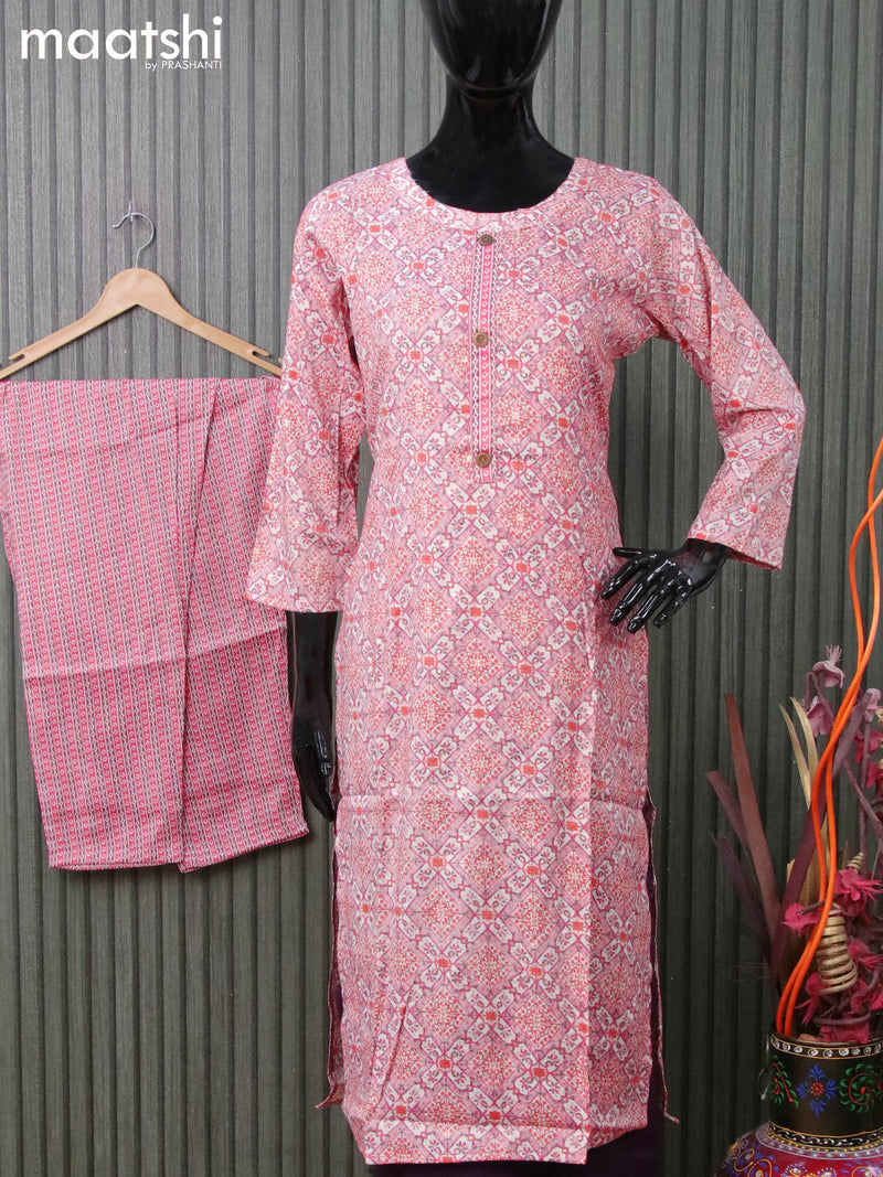 Rayon readymade kurti set off white pink shadewith allover prints and straight cut pant