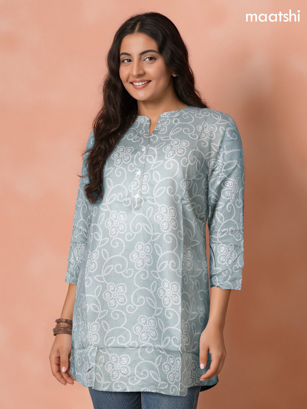 Soft cotton readymade short kurti pastel shade with allover bandhani prints & collar neck pattern and without pant