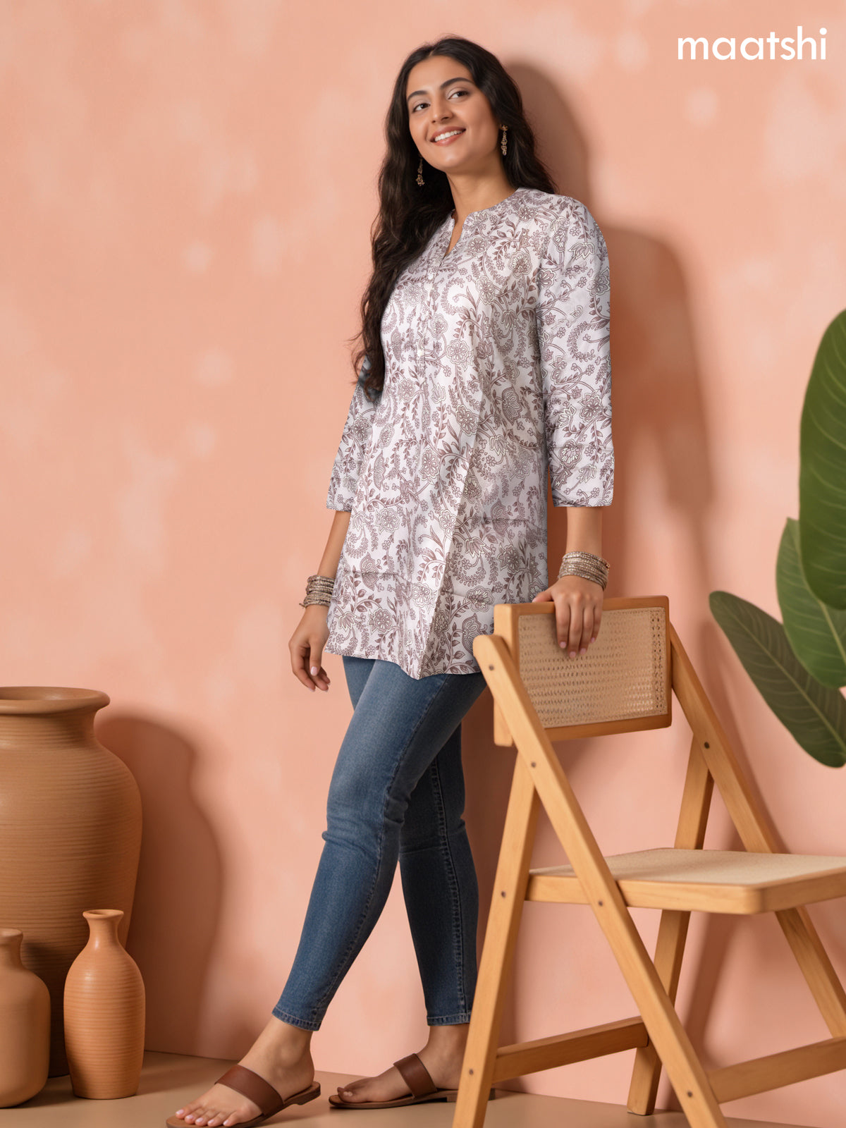 Soft cotton readymade short kurti pastel shade of pink with allover floral prints & collar neck pattern and without pant