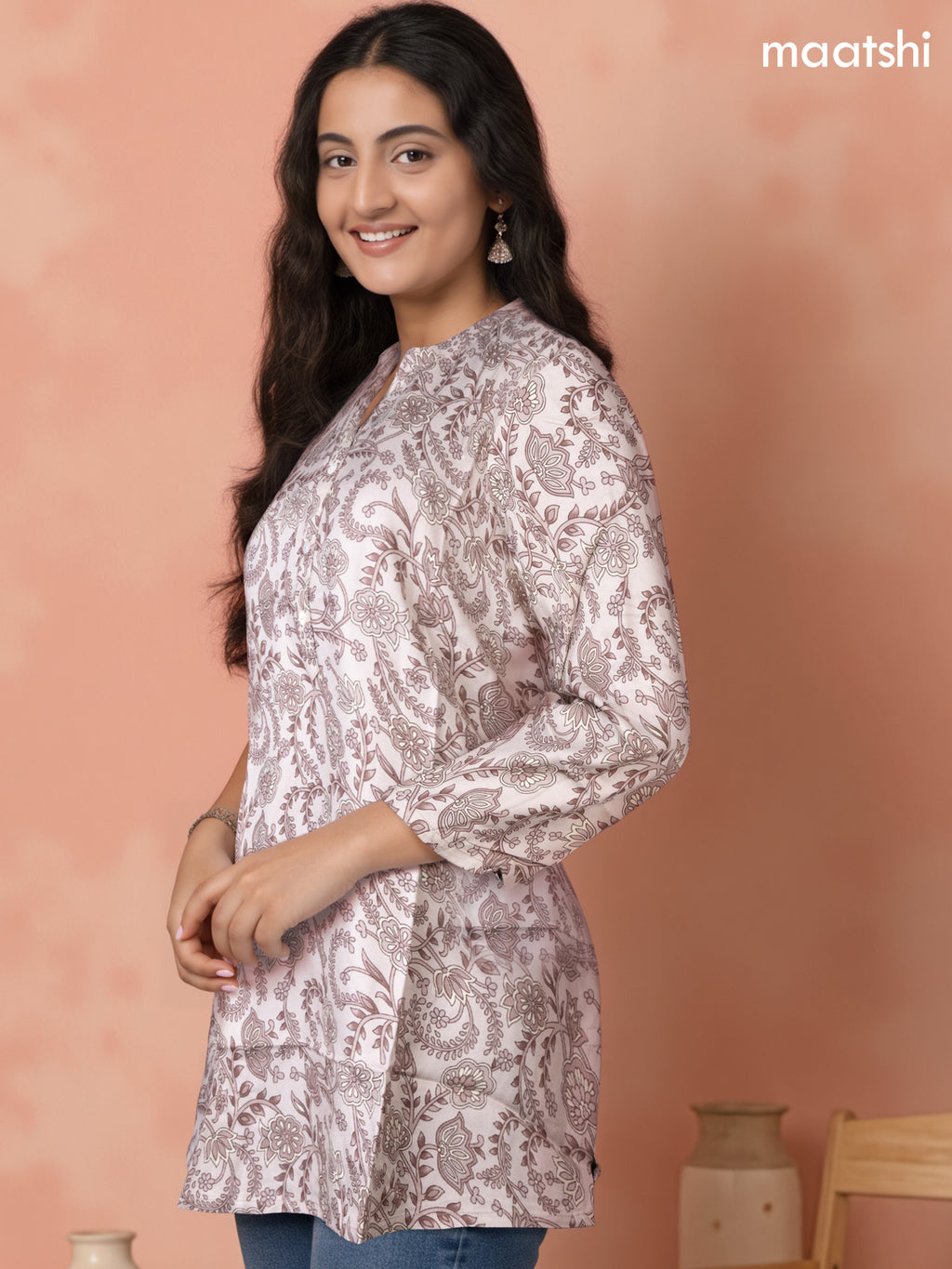 Soft cotton readymade short kurti pastel shade of pink with allover floral prints & collar neck pattern and without pant