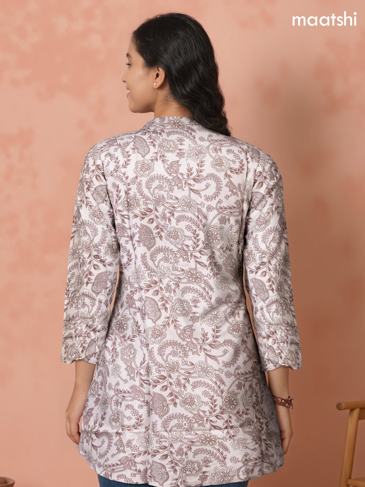 Soft cotton readymade short kurti pastel shade of pink with allover floral prints & collar neck pattern and without pant