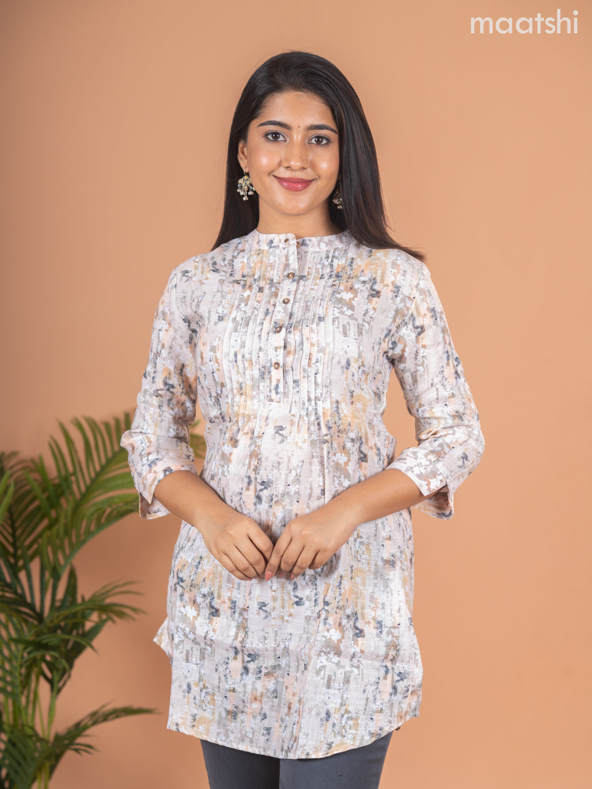 Rayon readymade short kurti elaichi green shade with allover prints & collar neck pattern and without pant