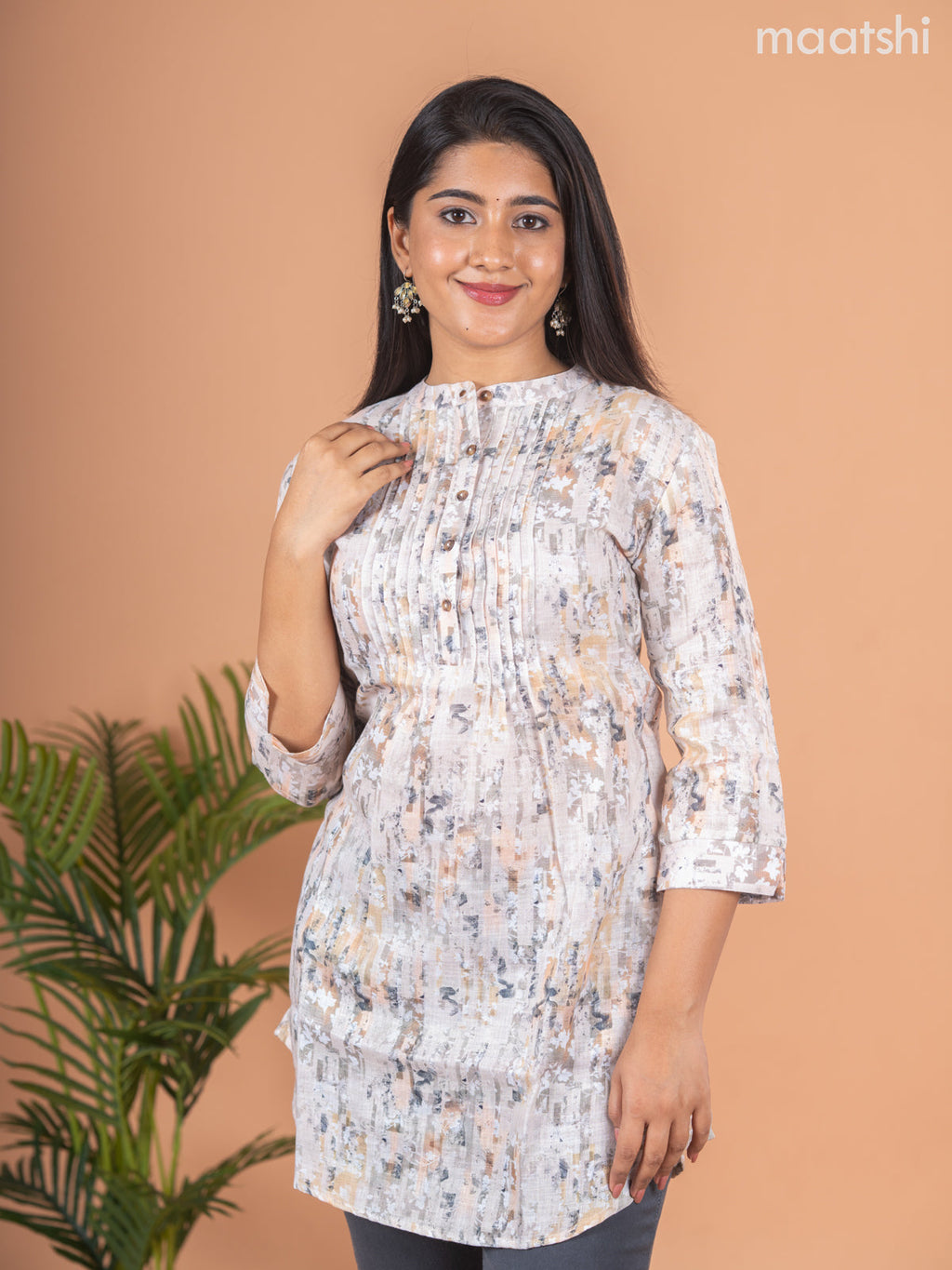 Rayon readymade short kurti elaichi green shade with allover prints & collar neck pattern and without pant