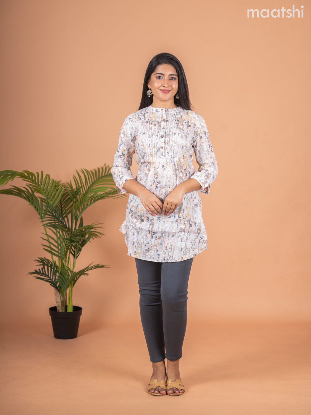 Rayon readymade short kurti elaichi green shade with allover prints & collar neck pattern and without pant