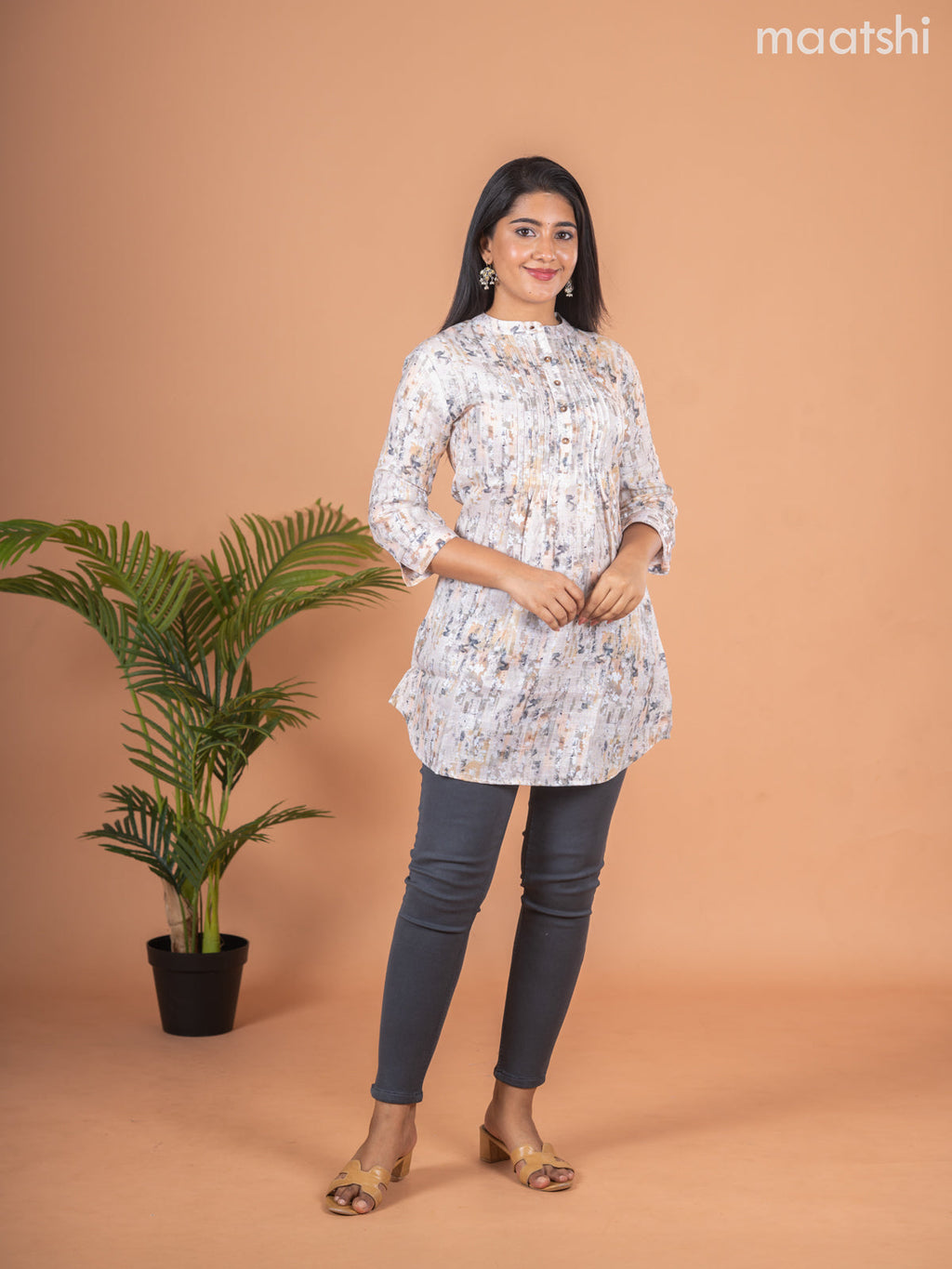 Rayon readymade short kurti elaichi green shade with allover prints & collar neck pattern and without pant