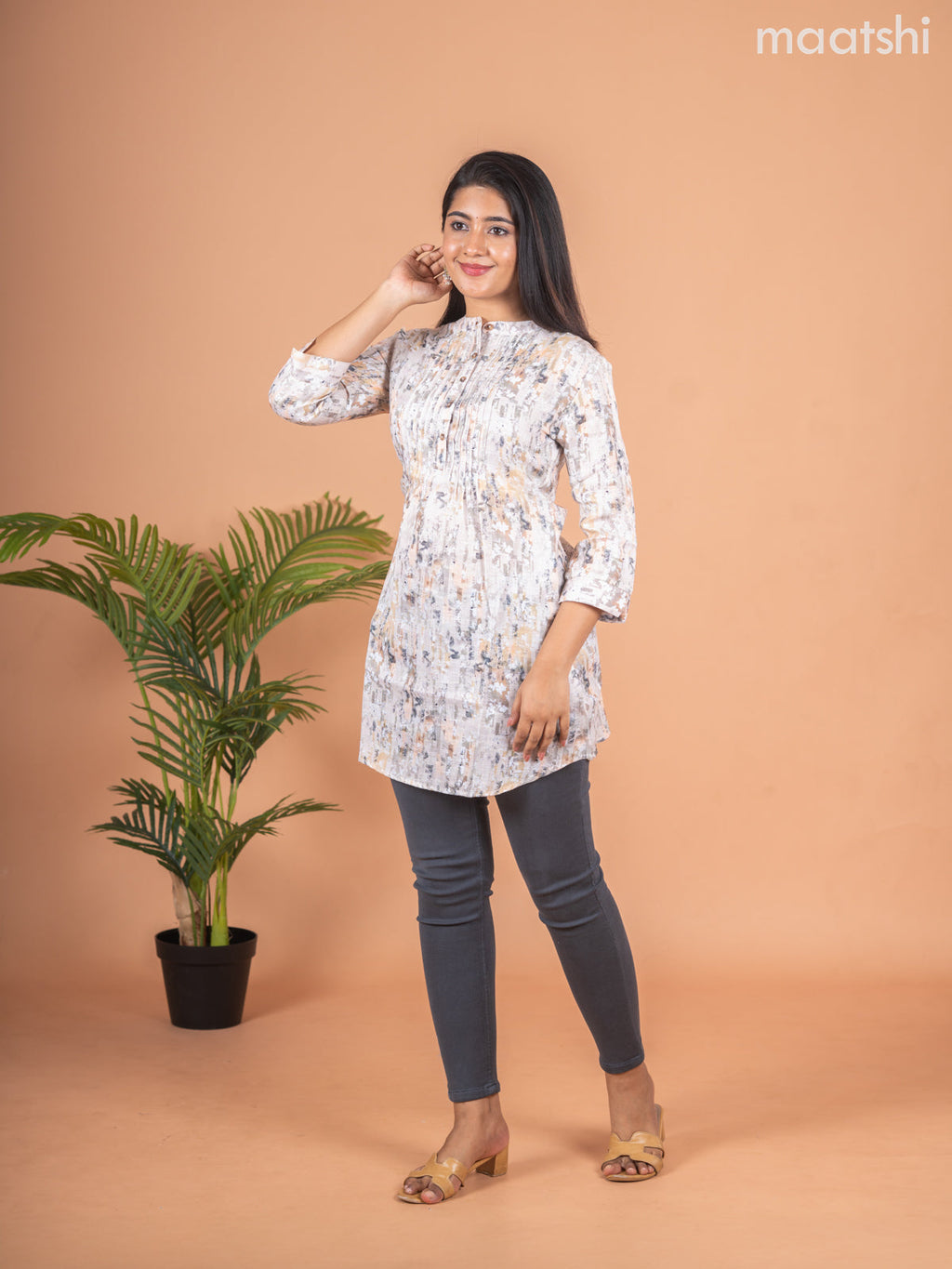 Rayon readymade short kurti elaichi green shade with allover prints & collar neck pattern and without pant