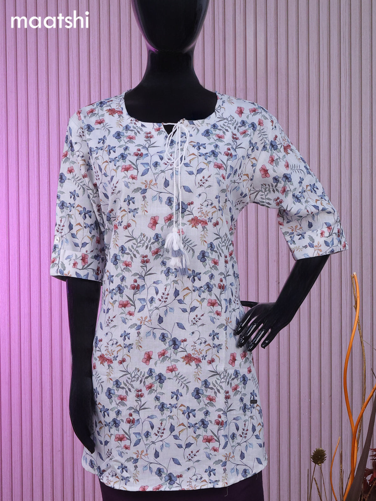 Rayon readymade short kurti off white with allover floral prints & simple neck pattern and without pant