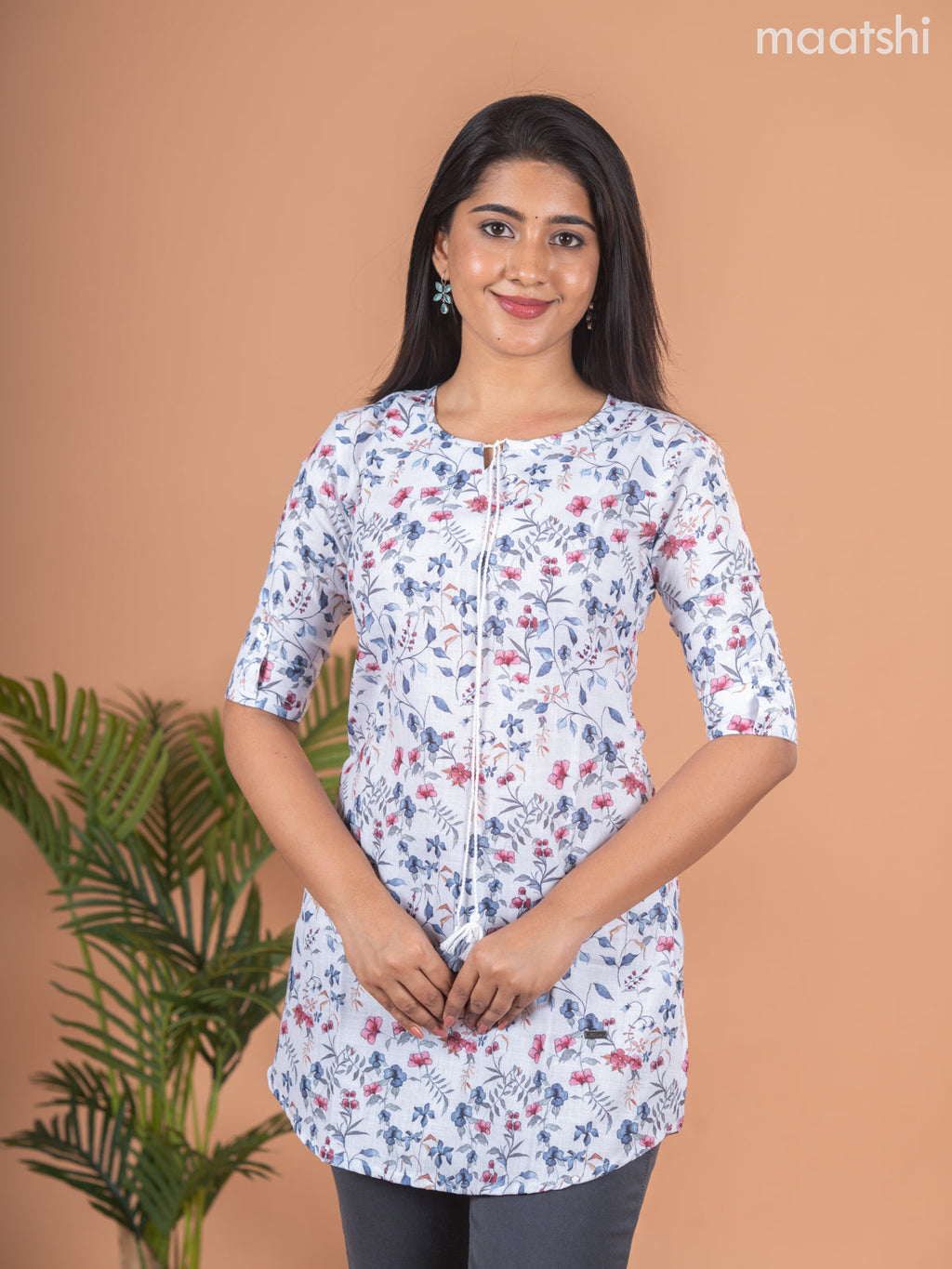 Rayon readymade short kurti off white with allover floral prints & simple neck pattern and without pant