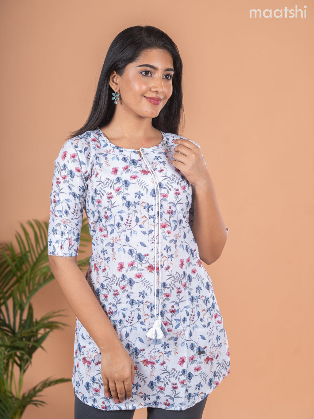 Rayon readymade short kurti off white with allover floral prints & simple neck pattern and without pant