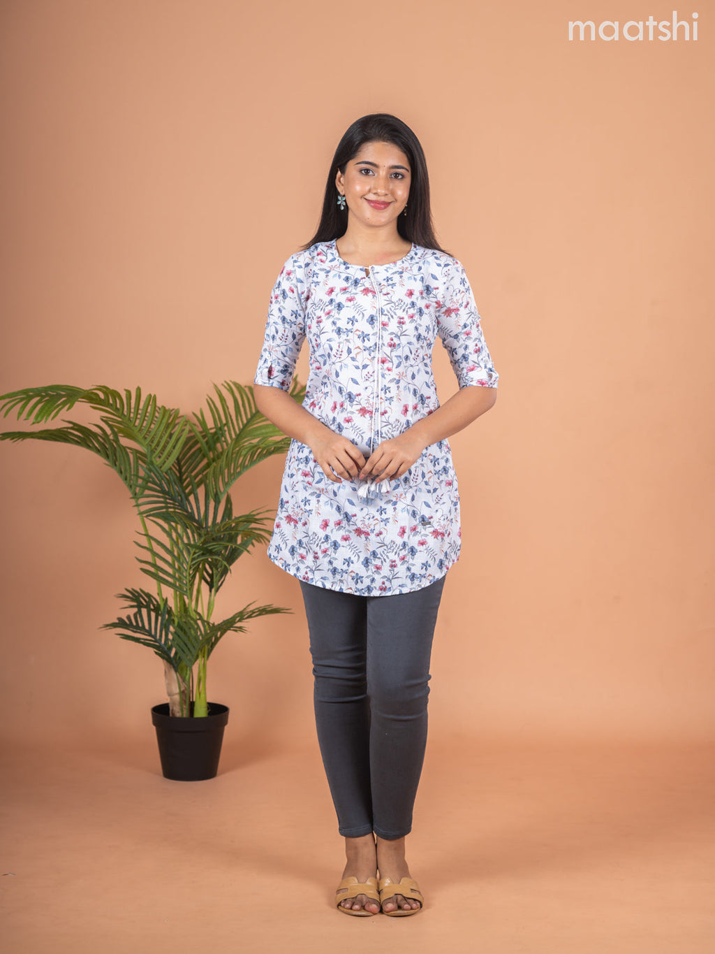 Rayon readymade short kurti off white with allover floral prints & simple neck pattern and without pant