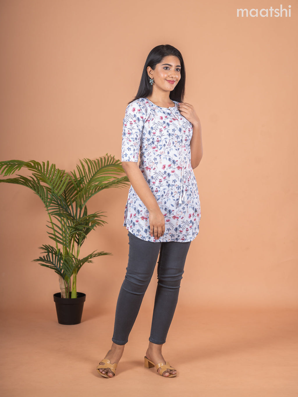 Rayon readymade short kurti off white with allover floral prints & simple neck pattern and without pant