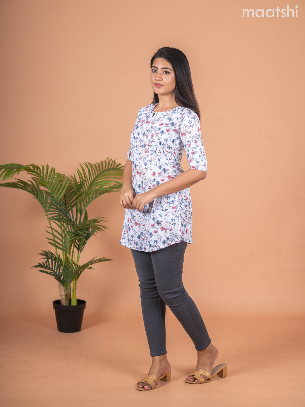 Rayon readymade short kurti off white with allover floral prints & simple neck pattern and without pant