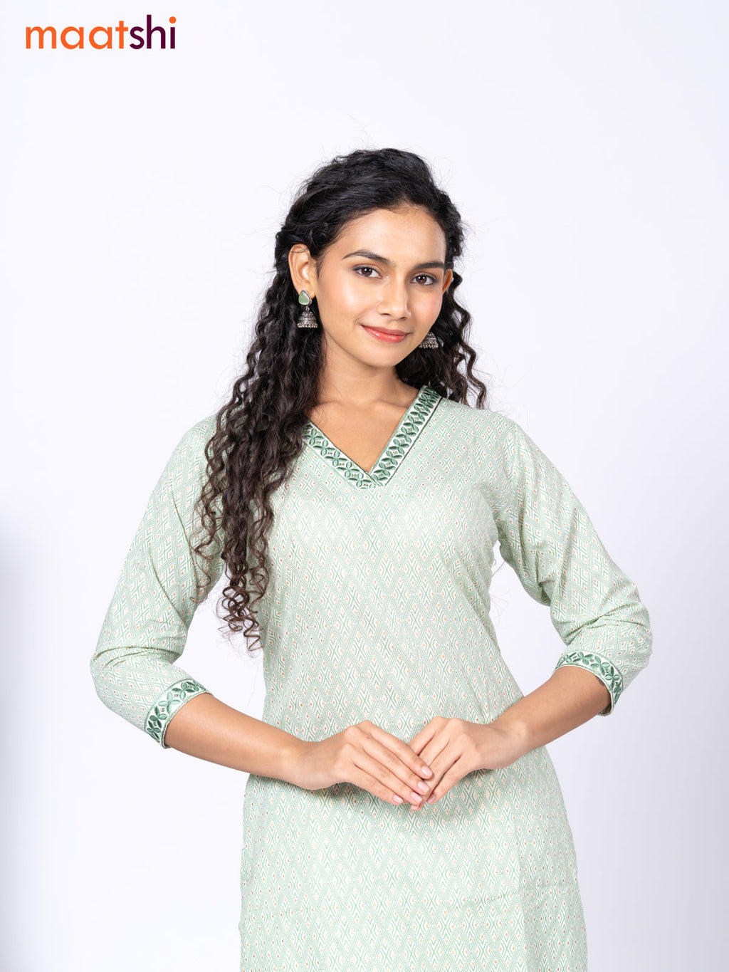 Cotton readymade kurti set cream and green with allover geometric prints & embroidery work v neck pattern and straight cut pant