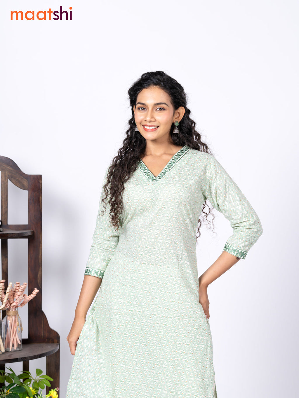 Cotton readymade kurti set cream and green with allover geometric prints & embroidery work v neck pattern and straight cut pant