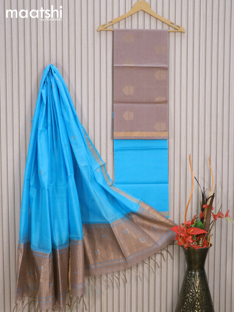 Silk cotton dress material grey shade and light blue with zari woven buttas and zari woven border