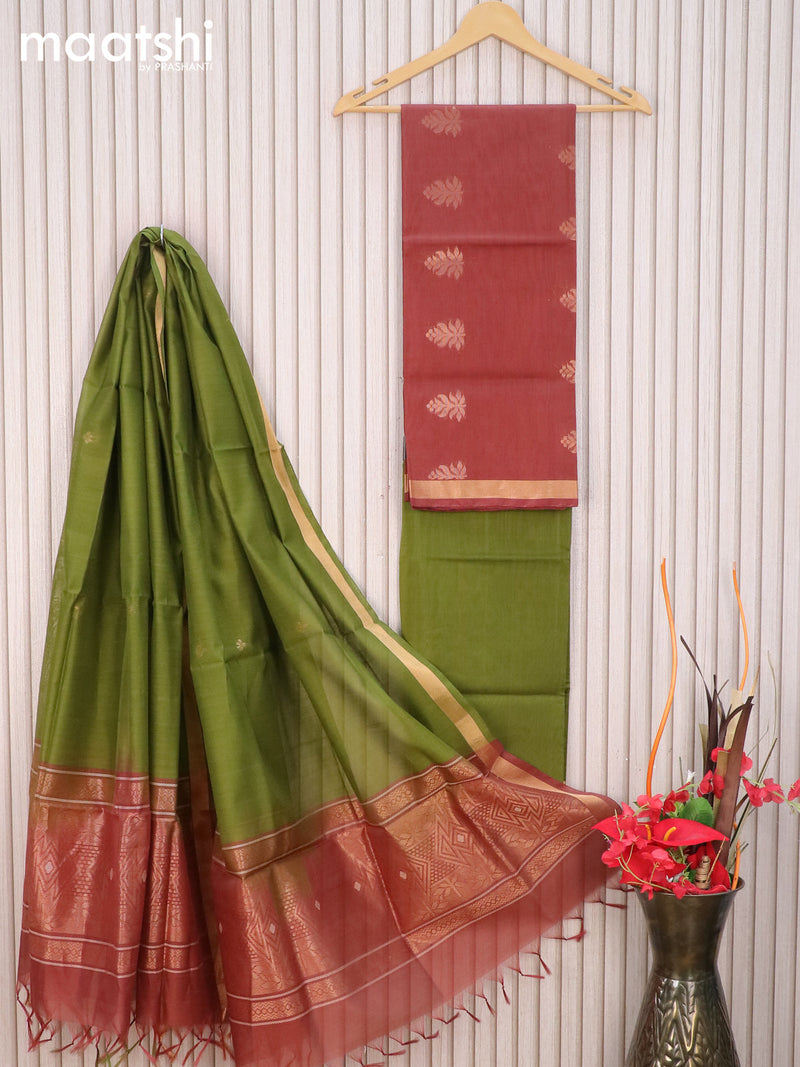 Silk cotton dress material brown shade and sap green with zari woven buttas and zari woven border