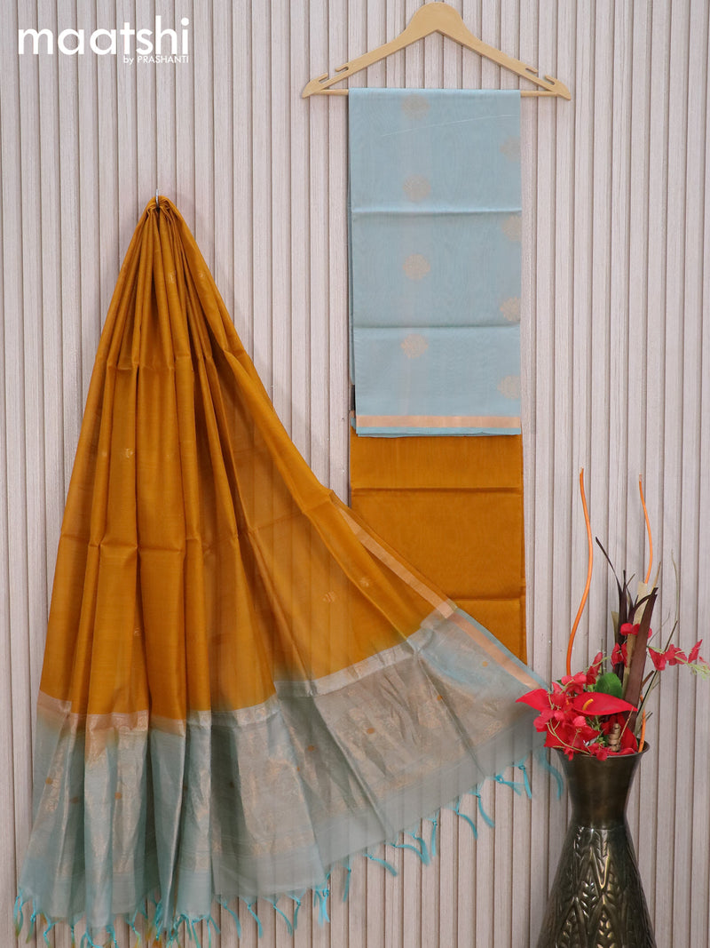 Silk cotton dress material pastel blue shade and mustard yellow with zari woven buttas and zari woven border