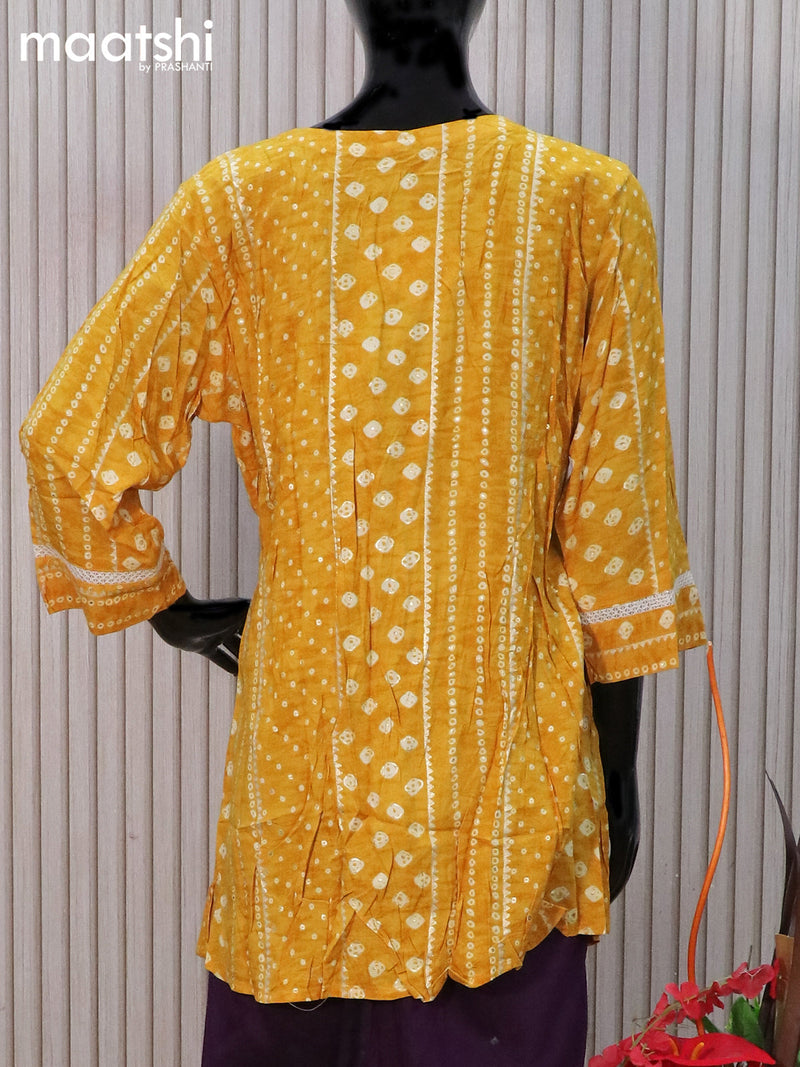 Cotton readymade tunic top mustard yellow with allover bandhani prints & beaded sequin work neck pattern without pant