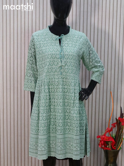 Semi georgette readymade tunic top pastel green with allover chikankari work & simple neck pattern without pant