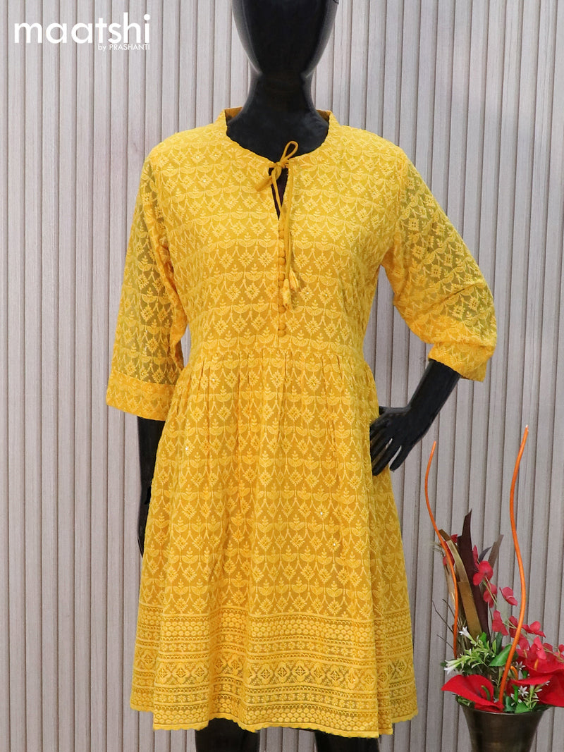 Semi georgette readymade tunic top yellow with allover chikankari work & simple neck pattern without pant
