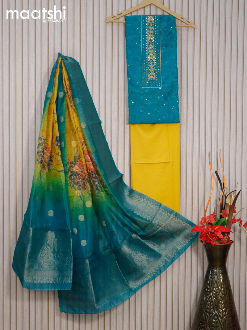 Raw silk dress material teal blue and yellow with allover sequin & mirror work neck pattern and bottom & banarasi dupatta